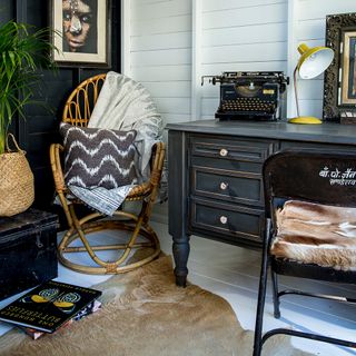 garden shed with drawer and wooden chair