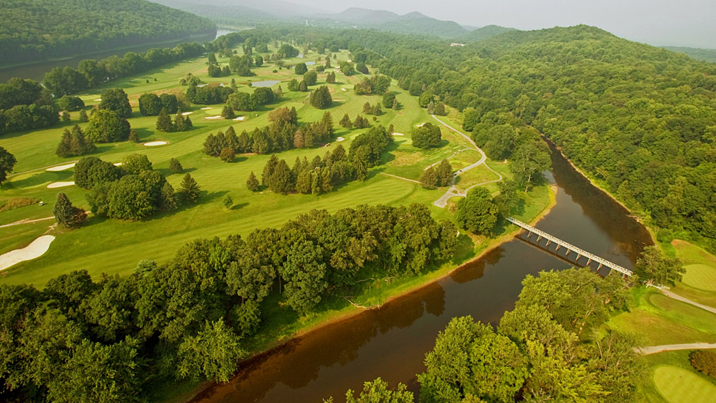 Aerial view of part of the Shawnee Inn and Golf Resort course running alongside the river 