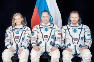Soyuz MS-19 crew, from the left: actress Yulia Peresild, cosmonaut Anton Shkaplerov and producer Klim Shipenko.