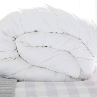 Scooms Hungarian Goose Down Duvet on a bed.