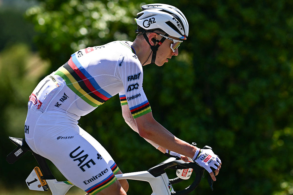 UAE Team Emirate - XRG team's Slovenian rider Tadej Pogacar cycles with the pack of riders (peloton) during the 12th stage of the 112th edition of the Tour de France cycling race, 180.6 km between Auch and Hautacam, in the Pyrenees mountains of southwestern France, on July 17, 2025. (Photo by Loic VENANCE / AFP)