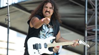 LONG BEACH, CALIFORNIA - JULY 26: Guitarist Cody Chavez of Drain performs onstage during day 1 of Warped Tour at Shoreline Waterfront on July 26, 2025 in Long Beach, California. (Photo by Scott Dudelson/Getty Images)