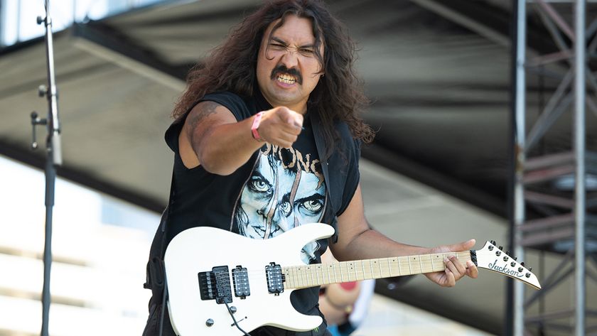 LONG BEACH, CALIFORNIA - JULY 26: Guitarist Cody Chavez of Drain performs onstage during day 1 of Warped Tour at Shoreline Waterfront on July 26, 2025 in Long Beach, California. (Photo by Scott Dudelson/Getty Images)