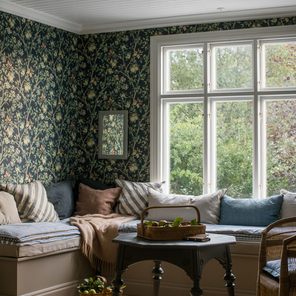 living room with wallpaper wall and glass window and corner sofa