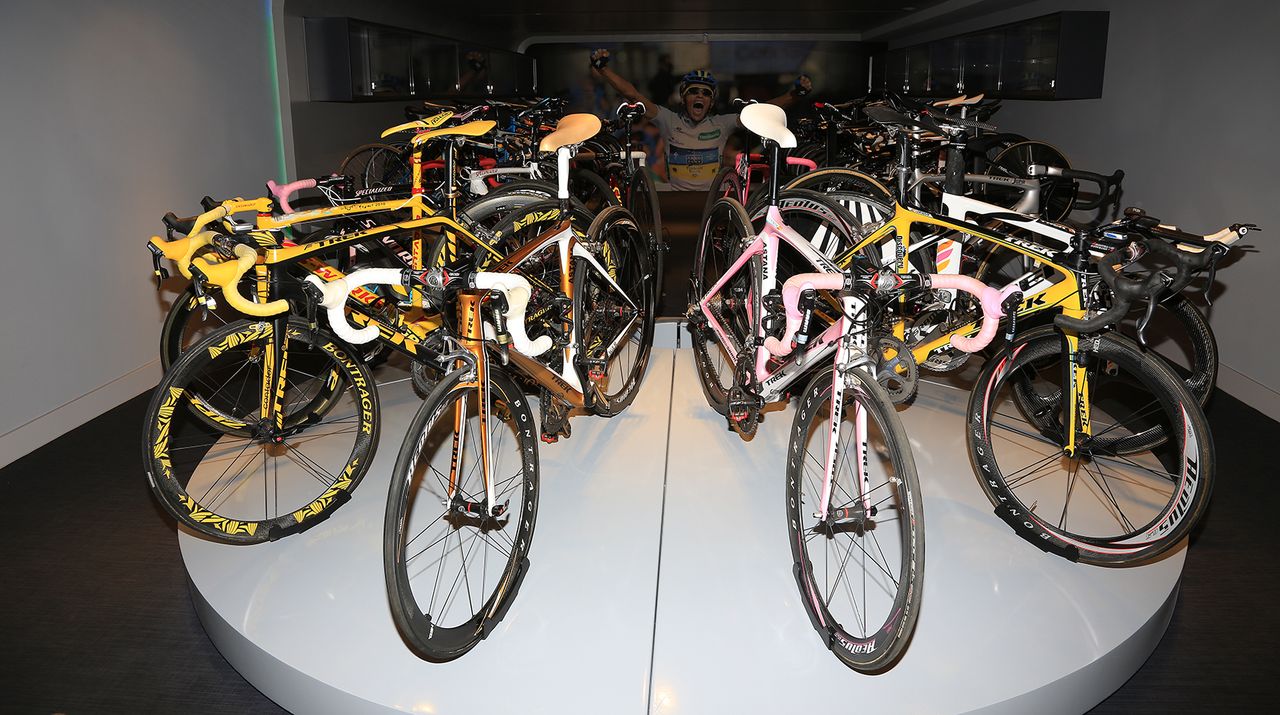 12 bikes are placed on a platform at the end of the room