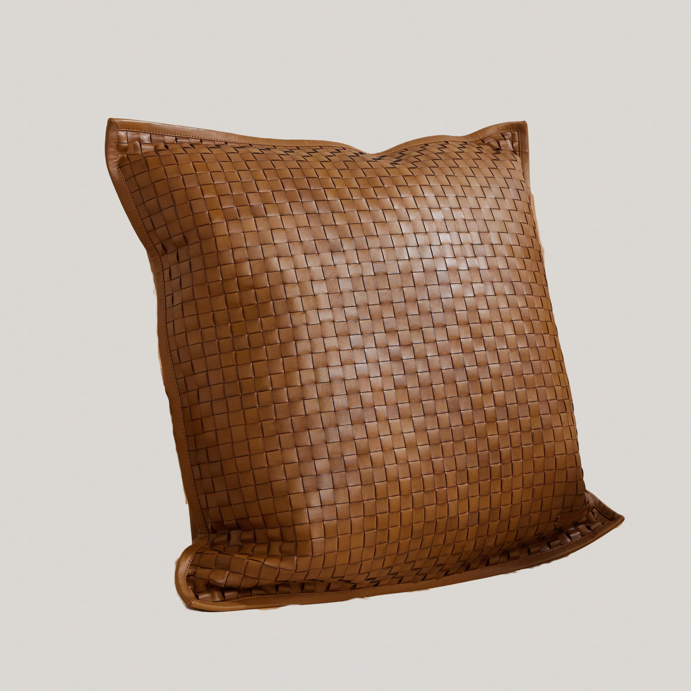 A braided leather cushion 