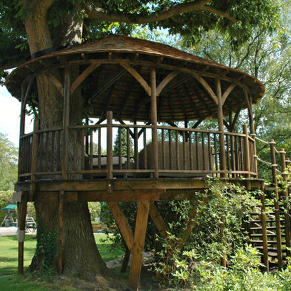 This treetop-dining house has open sides offering panoramic views of surrounding countryside