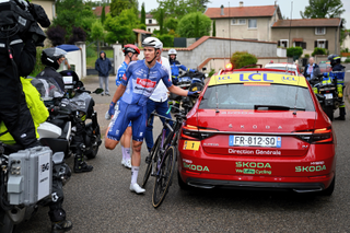 Tobias Bayer waits after the racing was neutralised on stage 5