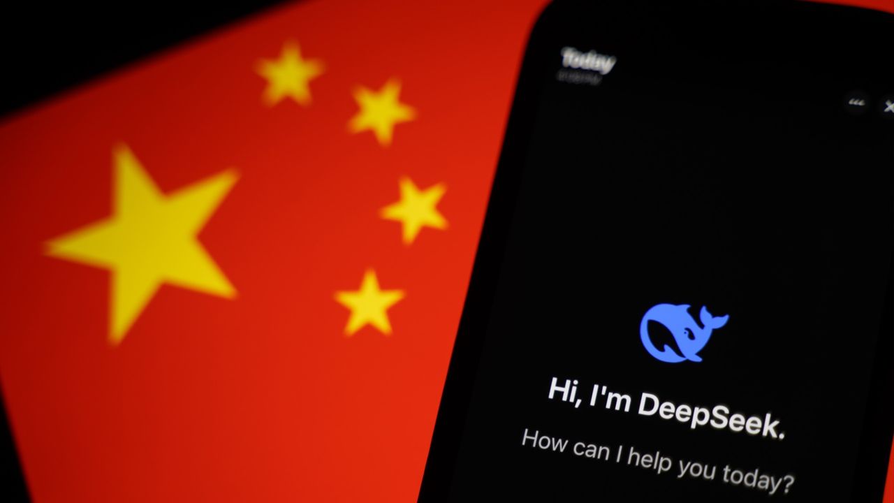 The DeepSeek app on a phone in front of China&#039;s flag