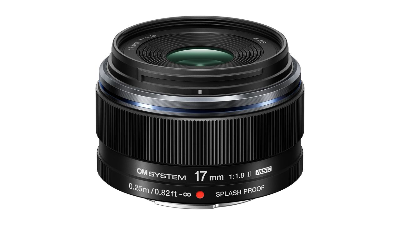 OM System M.Zuiko 17mm f/1.8 II against a white background