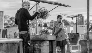 Roma Alfonso Cuaron talks Yalitza Aparicio through a scene