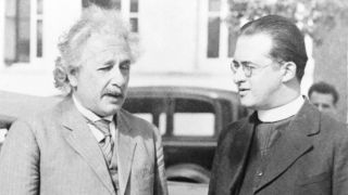 Albert Einstein stands next to Catholic priest Georges Lemaître in a black and white photo from 1900
