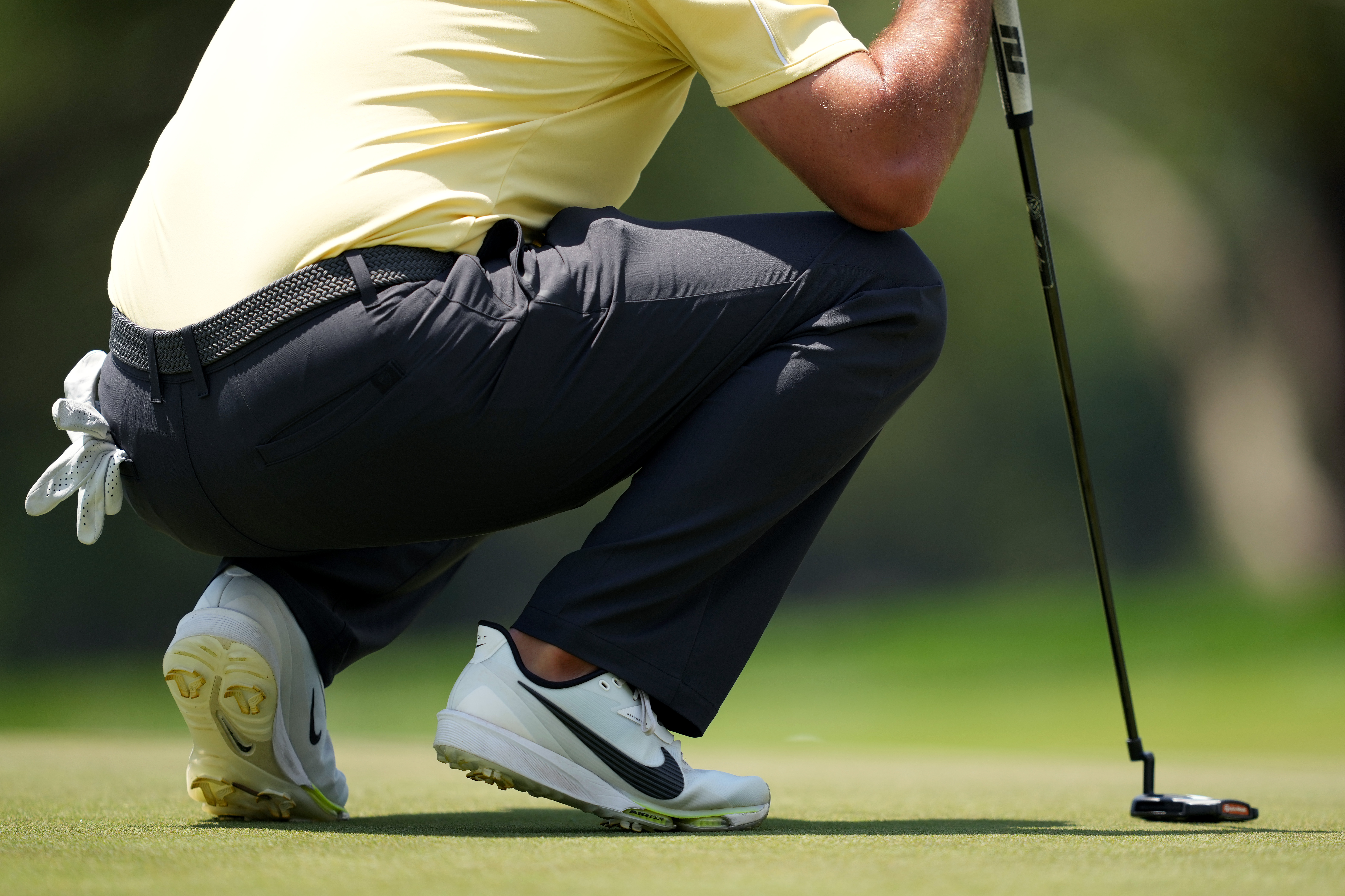 A detailed view of the shoes worn by Brooks Koepka of the United States on the first green during the final round of the ONEflight Myrtle Beach Classic