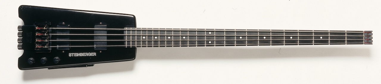 Studio still life of a 1980 Steinberger Bass L-2 headless bass guitar, photographed in the United Kingdom