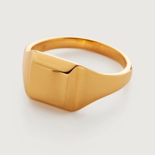 flat lay of gold ring 