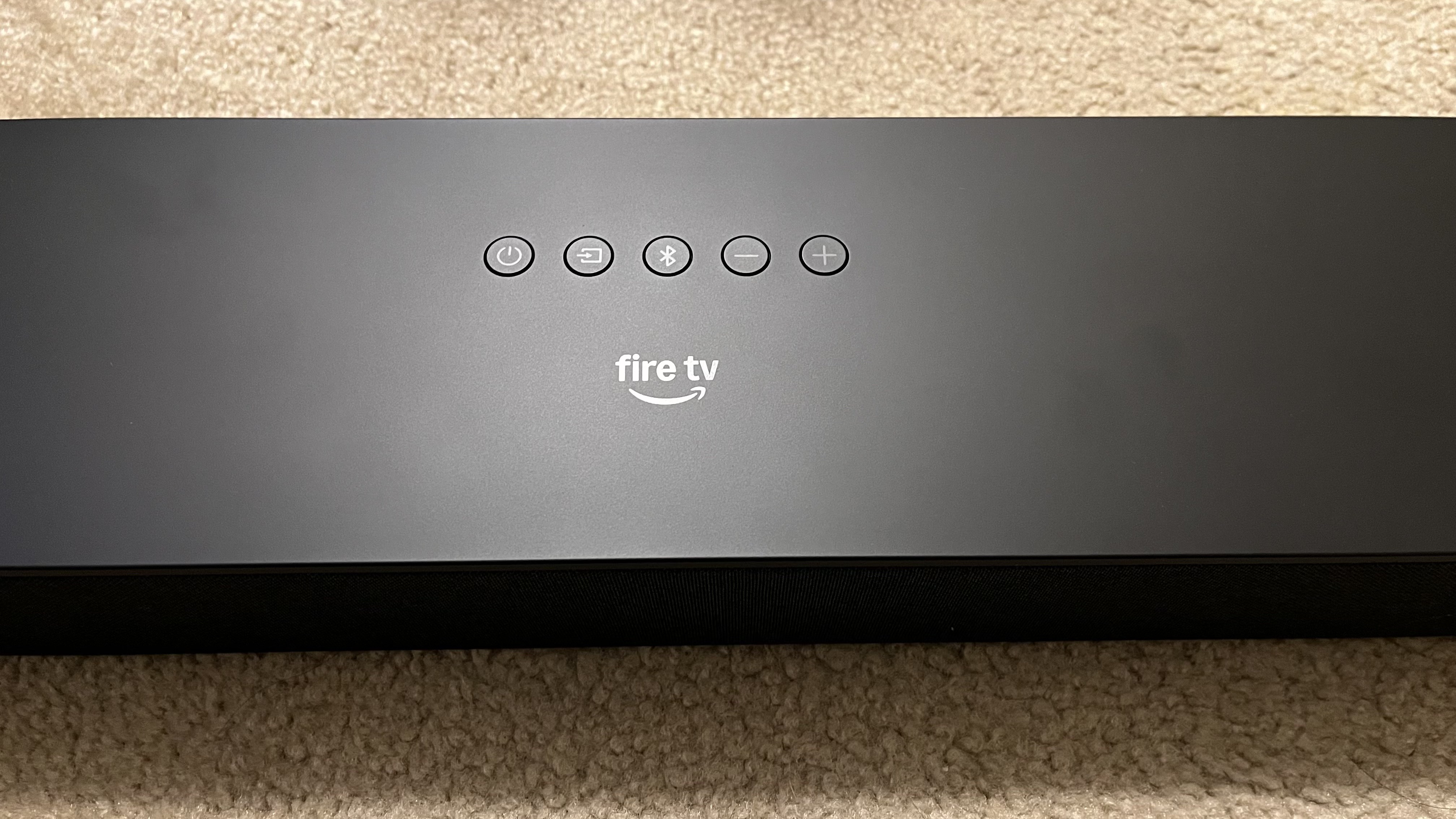 Amazon Fire TV Soundbar Plus top surface control buttons