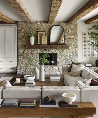 Living room with large white sofa designed by Joanna Gaines