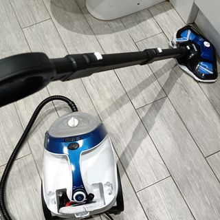 Cleaning the bathroom floor with the Polti Vaporetto Steam Cleaner