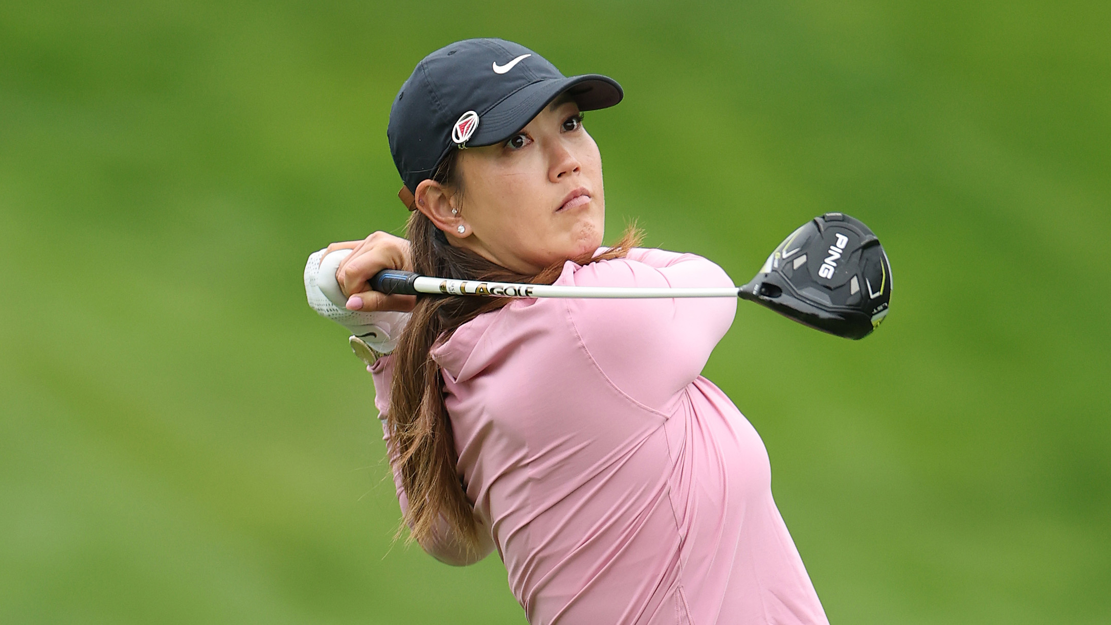 Michelle Wie West holds her finish on a drive