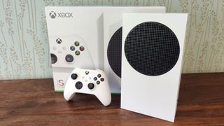Xbox Series S console in front of box