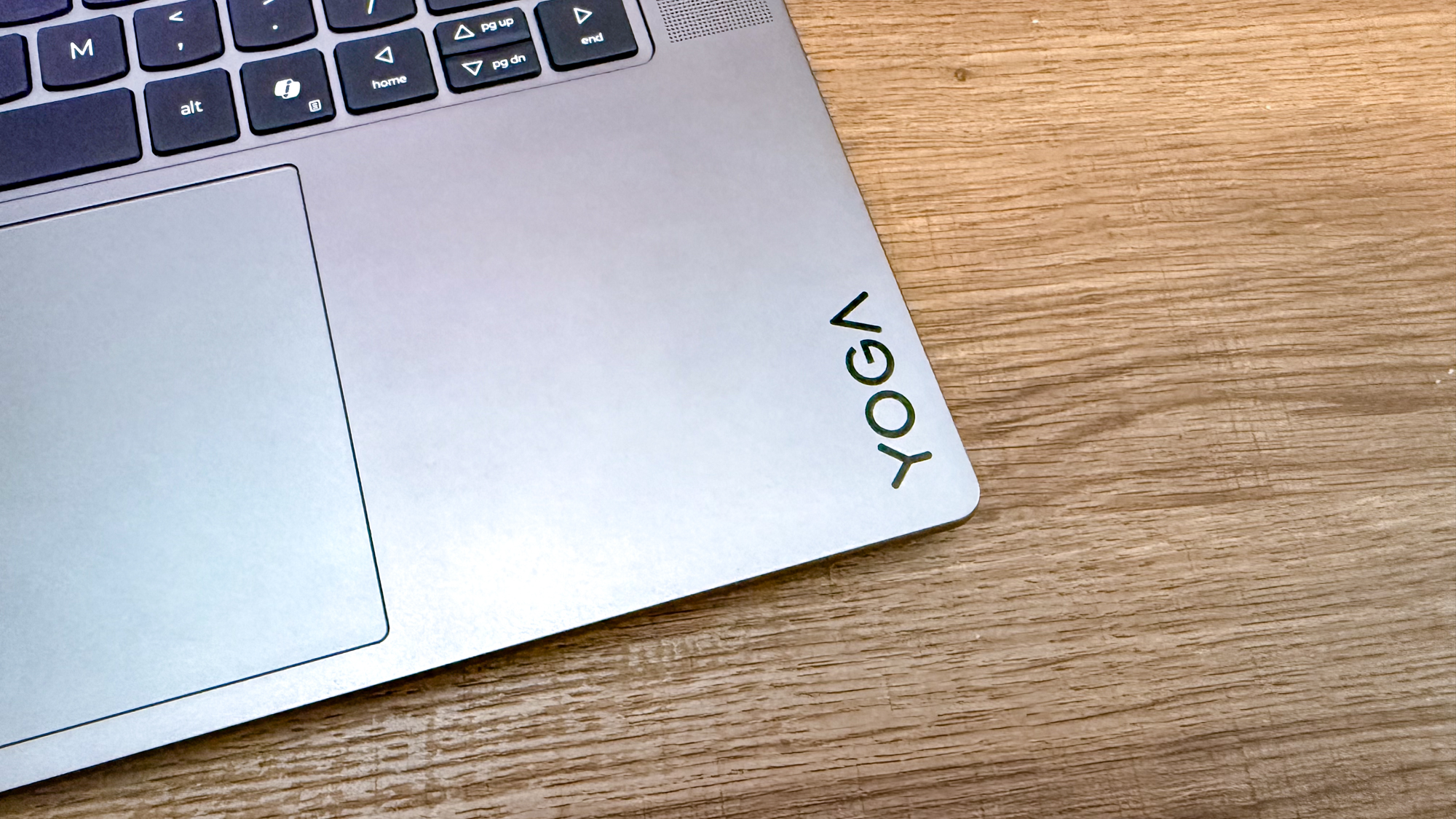 The Yoga logo imprinted on the bottom right corner of the Lenovo Yoga Pro 7i Gen 11 Aura Edition