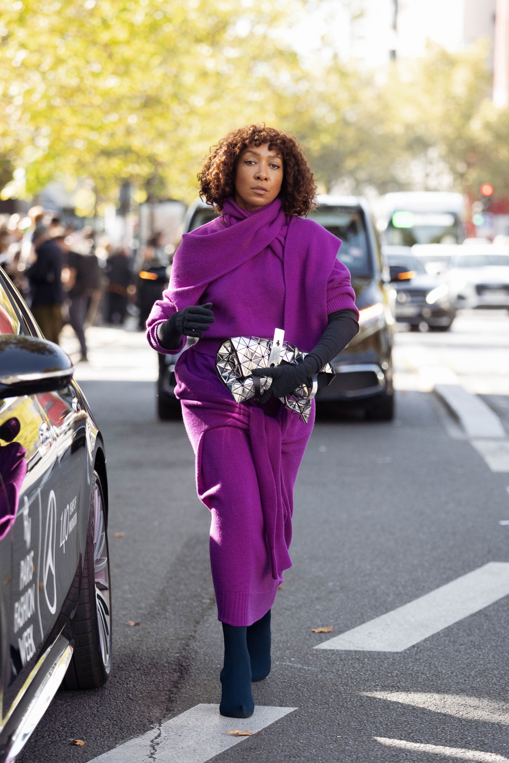 One showgoer at Paris Fashion Week wore the purple trend in sweater form