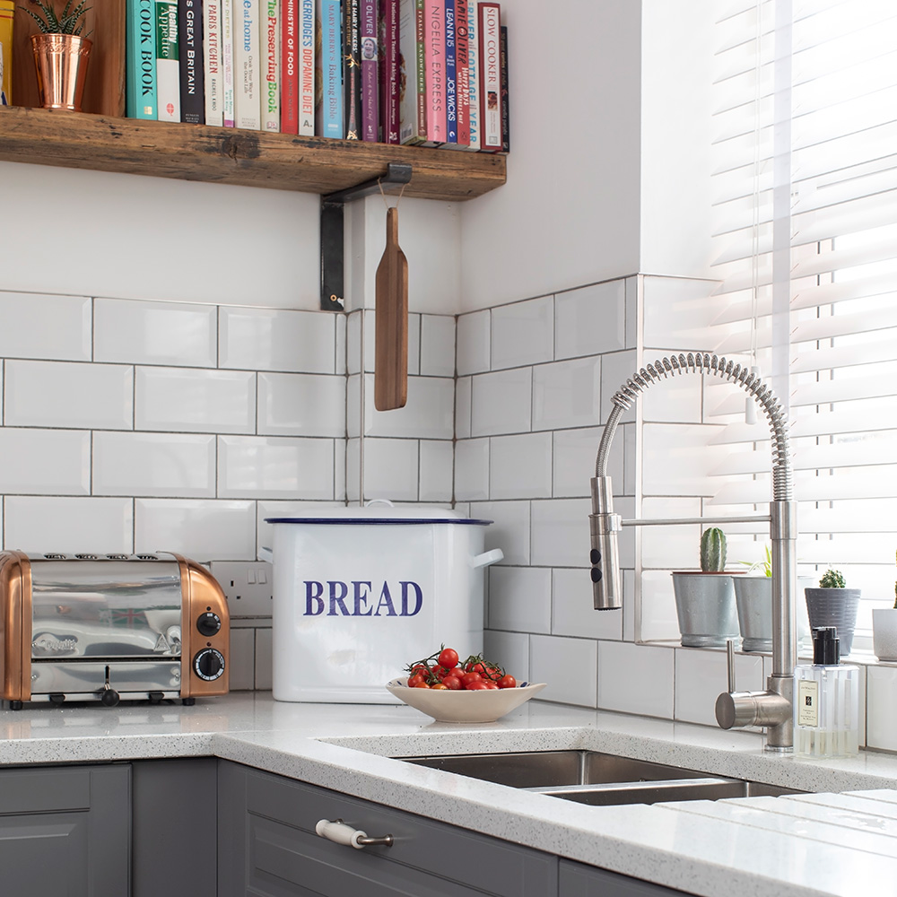 grey kitchen makeover with white metro tiles wood floors and green dining area