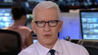 Anderson Cooper reports from a CNN Newsroom.