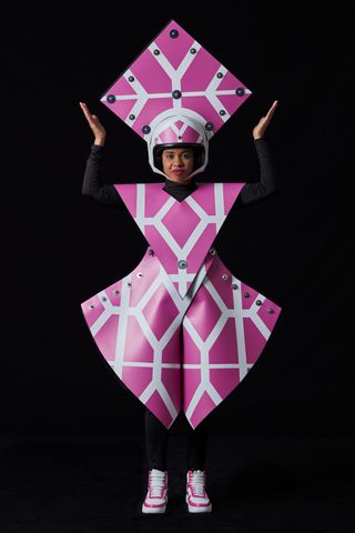Woman wearing geometric costume