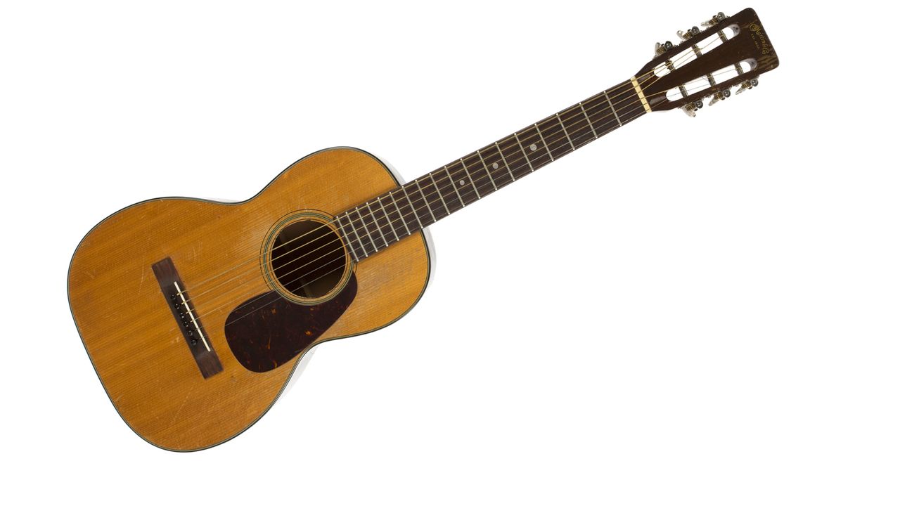 A 1950 Martin model 5-18, acoustic 6-string guitar (est $2000-2200)