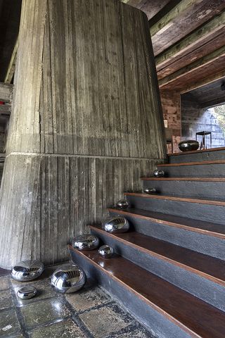 art and design pieces shown during aberto art and design fair in sao paulo inside the chu ming silveira brutalist house against raw concrete