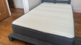 The Origin Hybrid Mattress on a bed