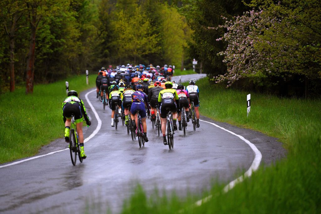 SCHLEIZ GERMANY MAY 27 The peloton during the 34th Internationale LOTTO Thringen Ladies Tour 2021 Stage 3 a 1165km stage from Schleiz to Schleiz Rain Landscape ltlt2021 lottothueringenladiestour womencycling on May 27 2021 in Schleiz Germany Photo by Luc ClaessenGetty Images