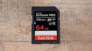 SanDisk Extreme Pro UHS I SD card, one of the best SD cards, on a wooden surface