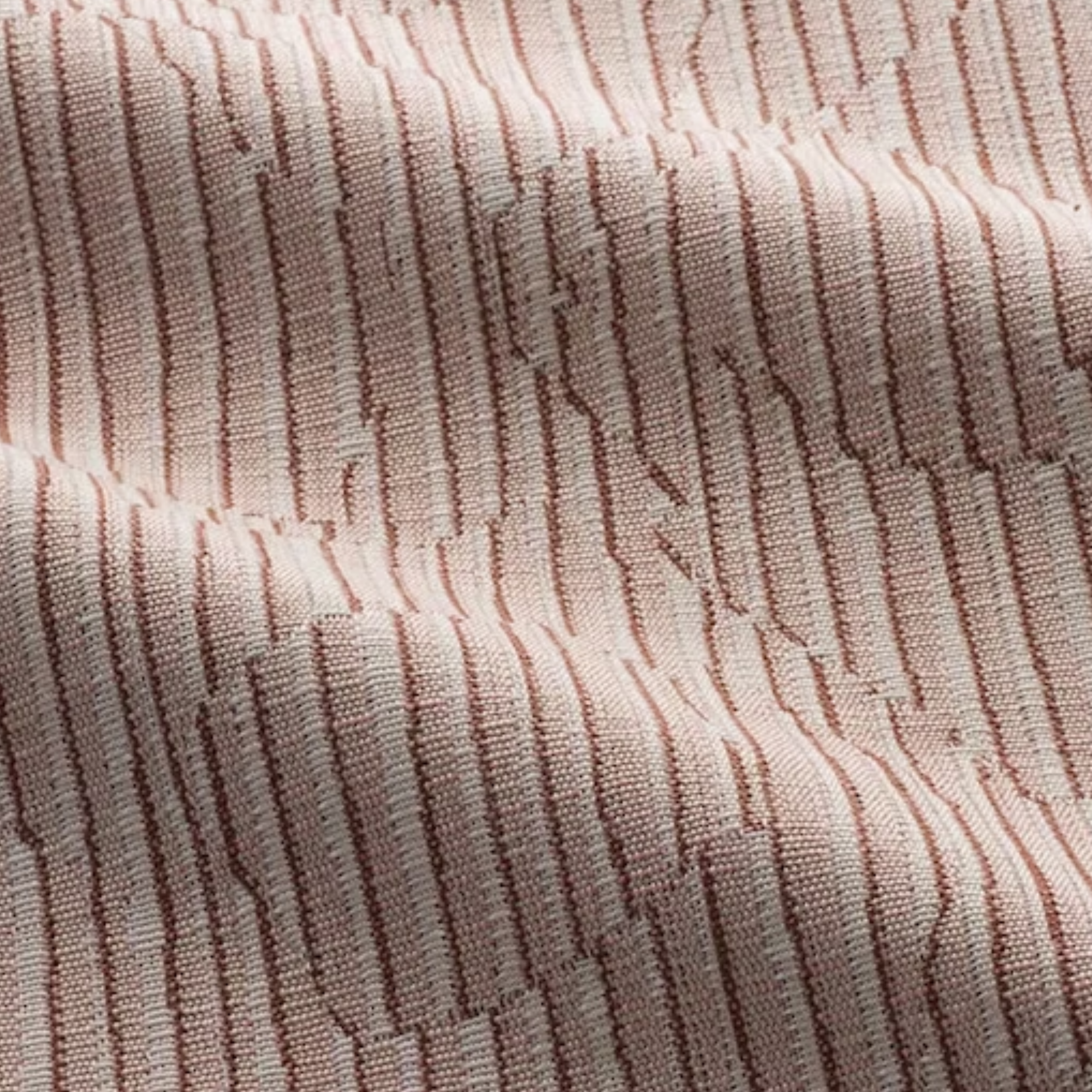 fabric in a red, pink, and white pattern