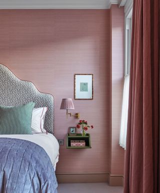 bedroom with pink textured walls