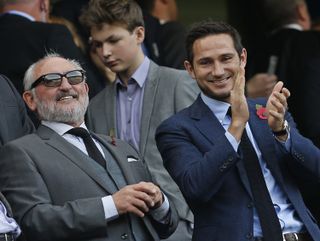 Frank Lampard watches a Chelsea game alongside his father, Frank Lampard Sr., in 2015.