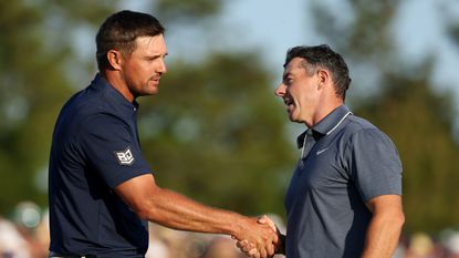 Bryson DeChambeau and Rory McIlroy shake hands at the end of the final round of the 2025 Masters at Augusta National