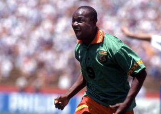 Roger Milla celebrates after scoring for Cameroon against Russia at the 1994 World Cup.