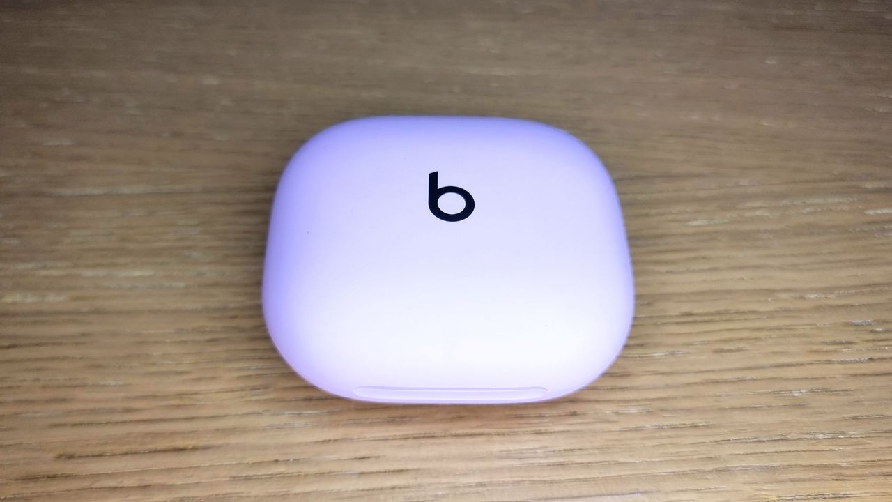 A close-up picture of the charging case for the Beats Powerbeats Fit earbuds