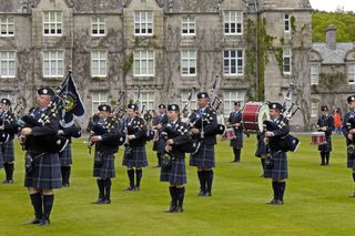 The Grampian Police Pipe Band at Balmoral Castle, Aberdeenshire, Scotland