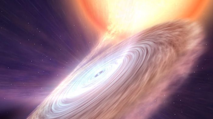 Depiction of neutron star blowing out warm and cold winds.