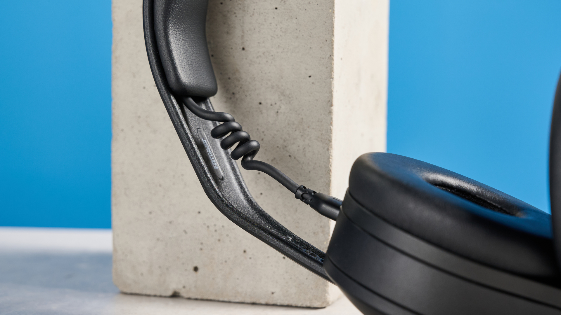 the rode nth-50 studio headphones in black showing the long cable, 3.5mm jack, 1/4 jack, and in use