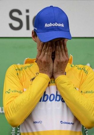 An emotional Luis Leon Sanchez (Rabobank) on the podium after taking over the lead at the Tour de Romandie.