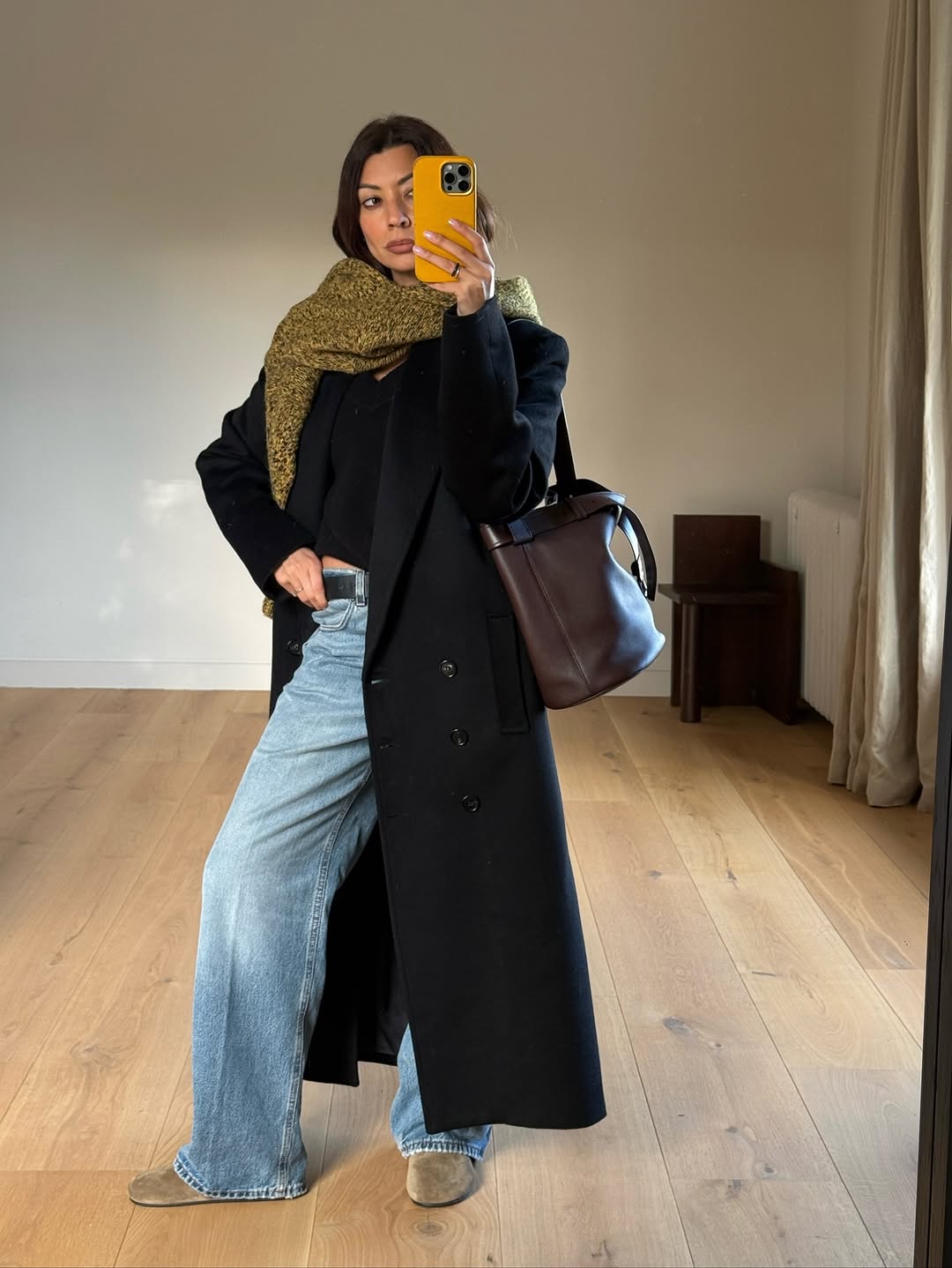 woman wearing shoe trend to wear with jeans 2026