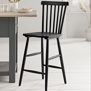 black bar stool in a kitchen 