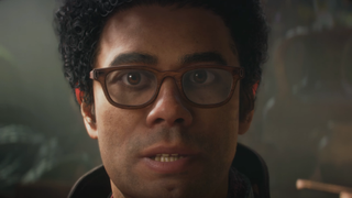 Richard Ayoade looking at the camera in Fable.