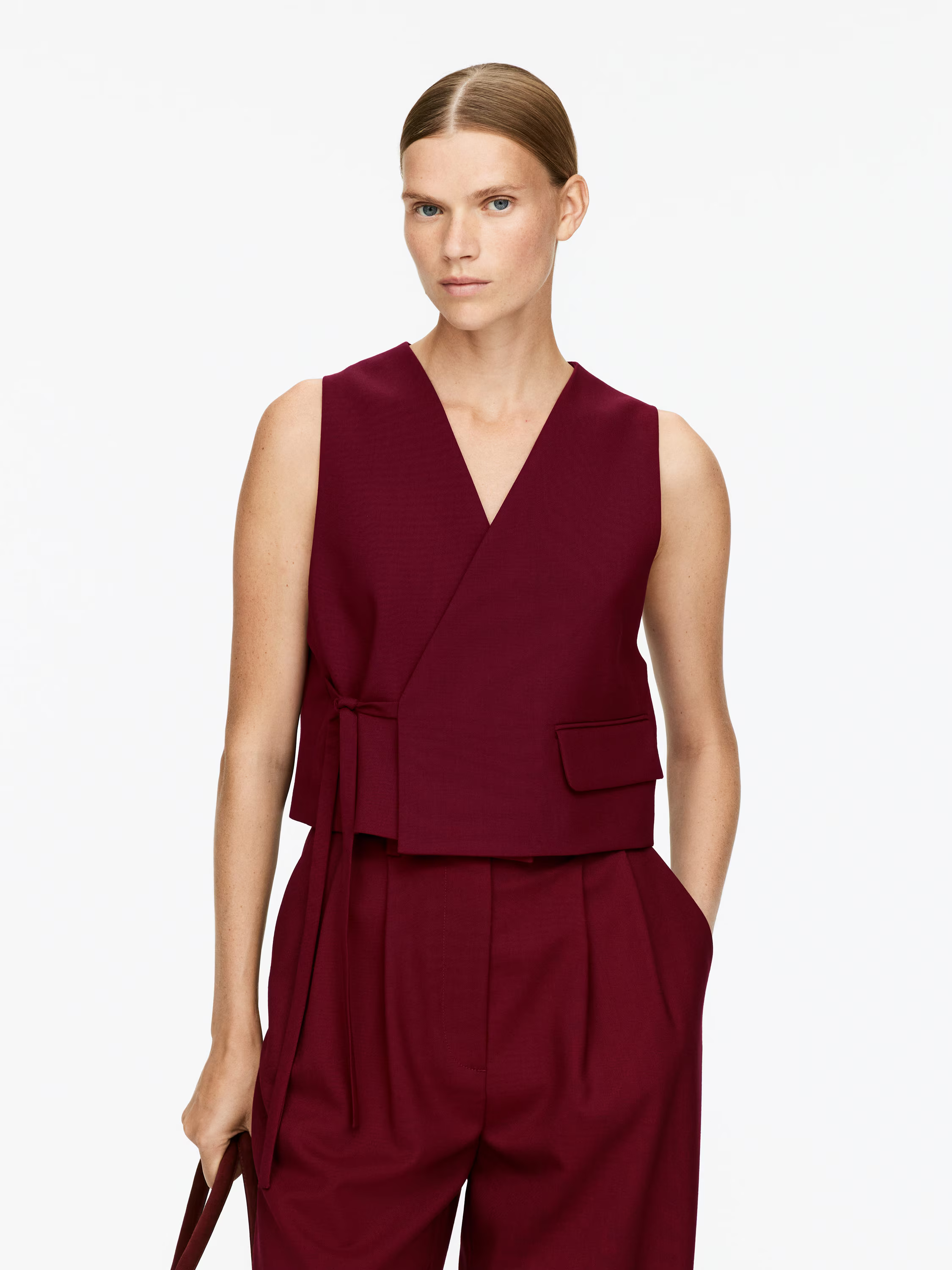 A model wears an Arket tailored waistcoat 