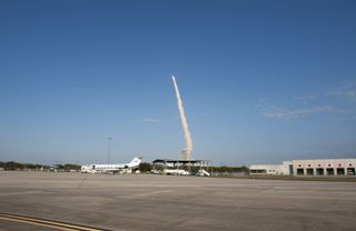 As seen from the Shuttle Landing Facility at NASA's Kennedy Space Center in Florida, space shuttle Discovery lifts off from Launch Pad 39A at NASA's Kennedy Space Center in Florida, beginning its final flight, the STS-133 mission, to the International Spa