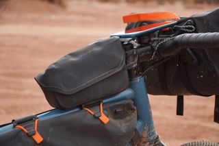 Smartphone and top tube bag mounted on a gravel bike